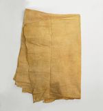 Barkcloth 'ahu A piece of thin barkcloth dyed a yellow-brownish colour that also exhibits some reddish and greyish discolouration. Used as a cloak-like cape.