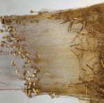 Fishing net upea Large fishing net of whitish parau with numerous weights of white coral tied with strands of plaited coconut fibre along the lower long sides, and floats of small parau sticks along the upper long sides.