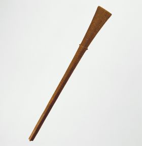 171.jpg Club made of brown wood carved with curved or zigzag lines and other patterns, as well as with representations of human figures, fish and turtles.