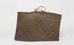 Basket kete Basket made of light and dark brown flax strips plaited together in a geometric pattern, with handles made of twisted cord.