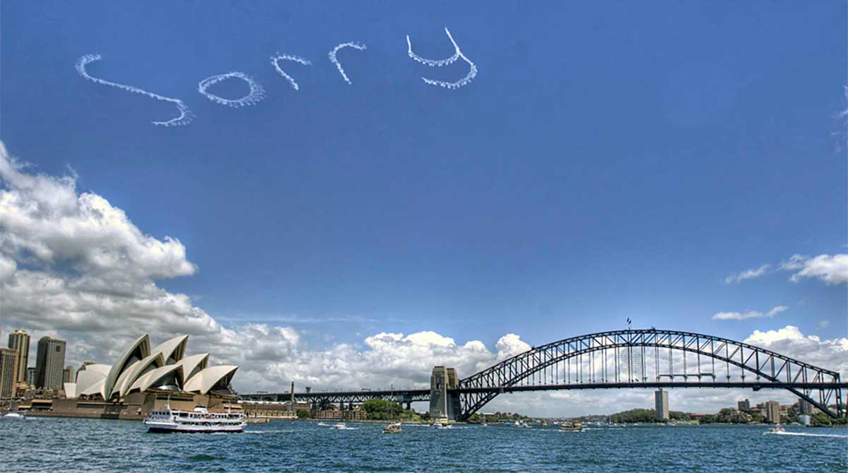 Sorry sky writing over Sydney Harbour.