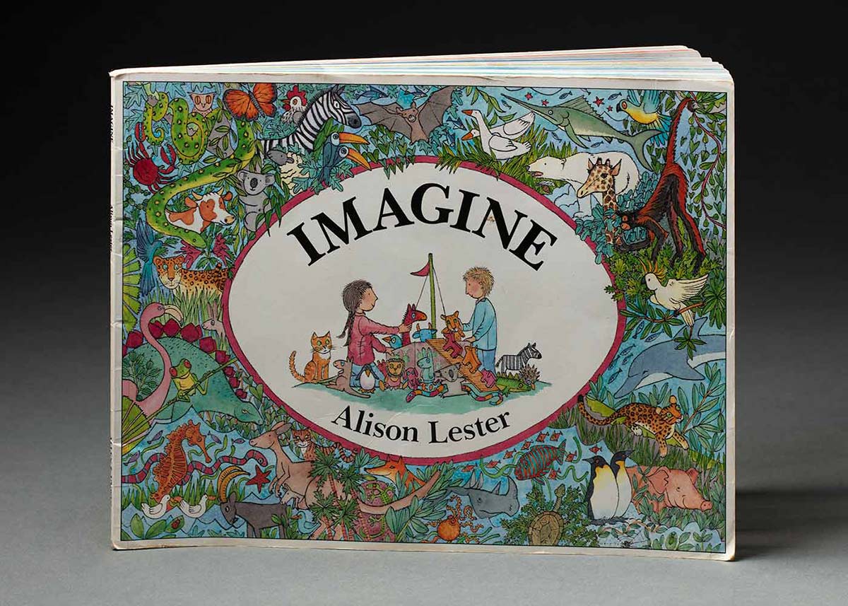 A children's book cover a central illustration of a boy and girl loading toy animals onto a boat. The rest of the cover has colourful illustrations of various animals on land and sea.