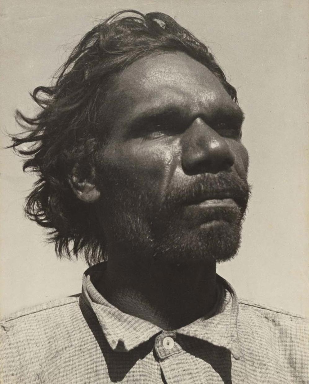 Black and white portrait of a man.