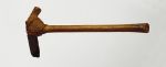 Adze to’i Large T-shaft stone axe with a handle made from medium brown hardwood and a blade made of fine-grained black basalt both tied together with coconut fibre.