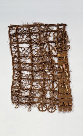 Apron sisi fale Apron made of coconut fibre, shell, fish teeth and scarlet feathers.