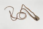 Sling ma’a A rotation sling. The pouch and cords are made as one piece, from coconut fibres, which are intertwined with other plant material and plaited into tight and firm coils.