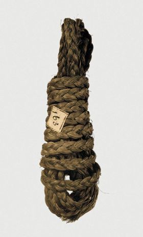114 Cord made of coconut fibres and wound into a ball.