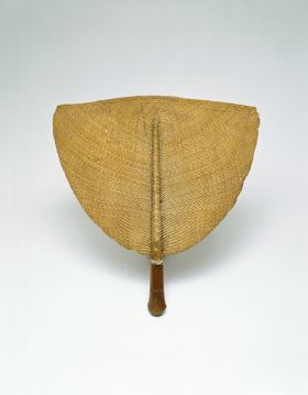 93.jpg Fan made of wicker, worked onto a medium-brown polished wooden handle.