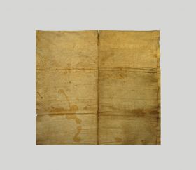 56.jpg Poncho-like garment made from thick white bark cloth, with a red border around it.