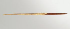316.jpg Wand made of pointed wood which is coated with the skin of a dog’s tail.