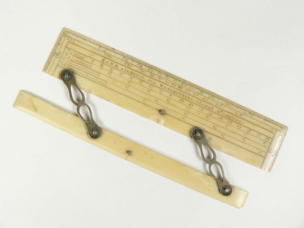 A hinged ruler from a set of drawing instruments.