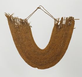 Breast ornament (gorget) taumi Horseshoe-shaped, collar-like breast ornament or gorget consisting of lattice-work made of some cane slips held together by twisted plant fibre strings.