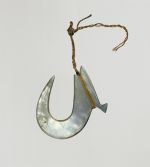 Fishhook matau Fishhook made of mother-of-pearl, where strings made of various plant fibres are attached.