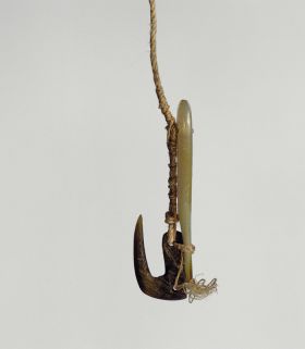 Fishhook mata’u Fishhook with mother-of-pearl shank, the hook made of tortoiseshell, both secured together with twisted cord of plant fibre.