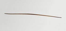 Bow Bow made of wood slightly and unevenly bent, being narrower in the middle, and ends.