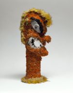 313.jpg Feathered idol with the shape of a human figure, formed of wicker-work, overlaid with feathers of red, yellow and black. The eyes are mother-of-pearl and the mouth fitted with dog-teeth.
