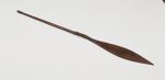 226.jpg Wooden paddle of a war canoe. The shaft is decorated with ornaments at the handle and at the connection of the blade.