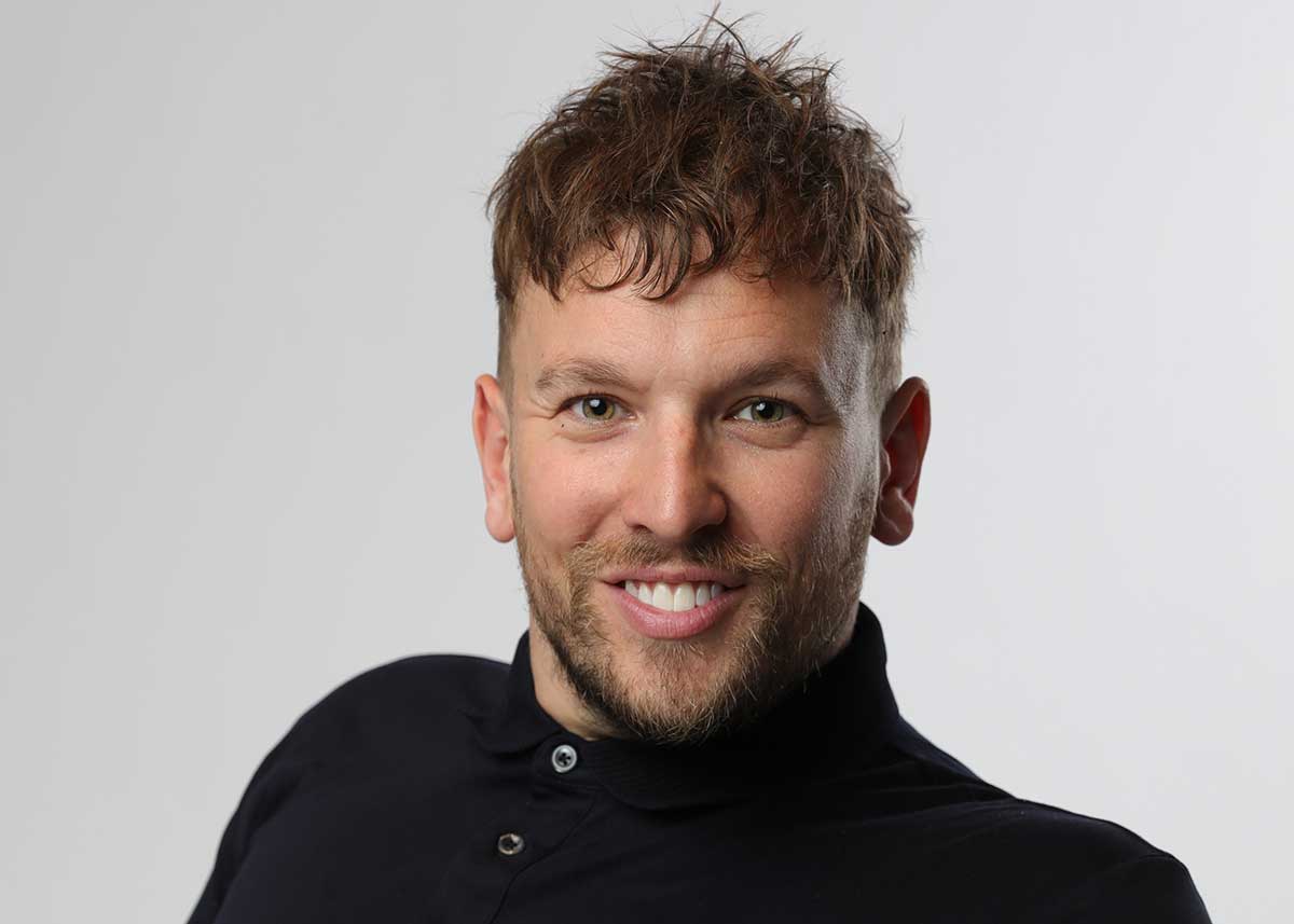 Studio portrait photograph of Dylan Alcott.