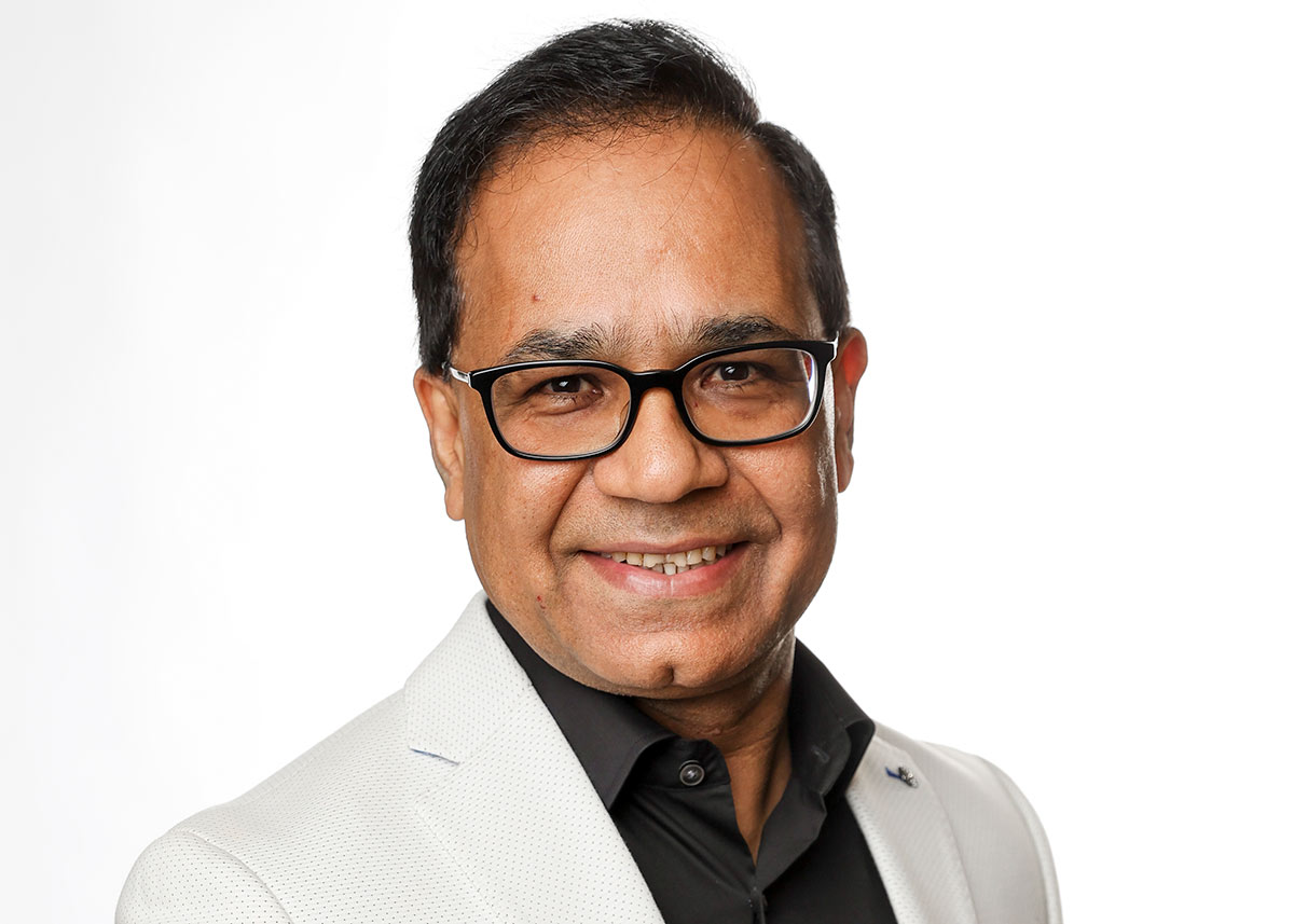 Studio portrait photograph of Angraj Khillan.