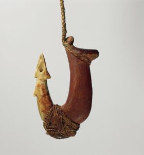 Fishhook matau Two-part fishhook made of wood with twisted cord and lashing made of plant material.