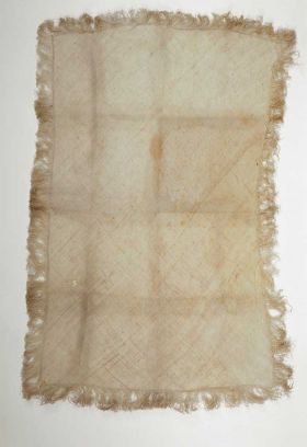 Mat sina Mat made from a white plant material. The leaf strips are diagonally plaited. Mat edges are fringed.