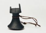 Pounder penu Pounder made from a single piece of black basalt with polished finish. A string binding at the neck is plaited from plant fibres. The object has a pounding surface, neck and a head part.