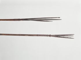 224.jpg Fishing spears made of a dark brown bamboo tube, with a three-part point made of a dark wood at the ends, attached with finely plaited coconut fibres.
