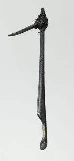 96.jpg Tattooing comb made of wood and plant fibre. The blade is made from bone.