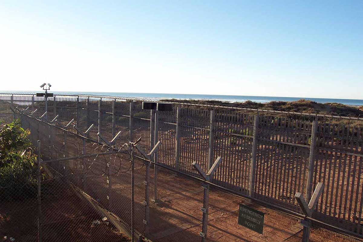 View through the fence at the Port Hedland Detention Centre.