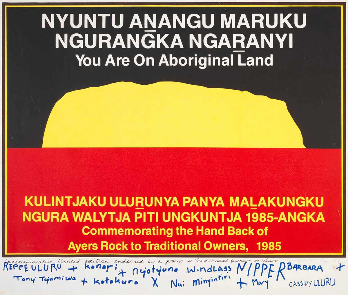 A limited first edition print poster similar in design to the black over red Aboriginal flag, but the sun in the centre has been replaced by a yellow silhouette of Uluru (Ayers Rock).