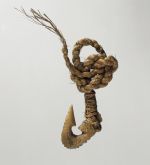 Fishhook matau Fishhook made of bone with serrated outer edge and twisted cord.