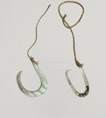 Fishhook matau Fishhook made of mother-of-pearl, where strings made of various plant fibres are attached.
