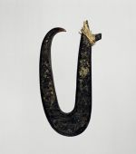 Fishhook matau Fishhook made of a large dark purple pinna shell where strings made of various plant fibres are attached.
