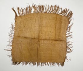 63.jpg Hand-woven cloak made of flax with a fringed edge.