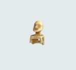 Hat ornament Hat ornament made of the bone of a marine animal, carved into the form of a seated male figure, with eye sockets large and deep, and mouth slightly open.