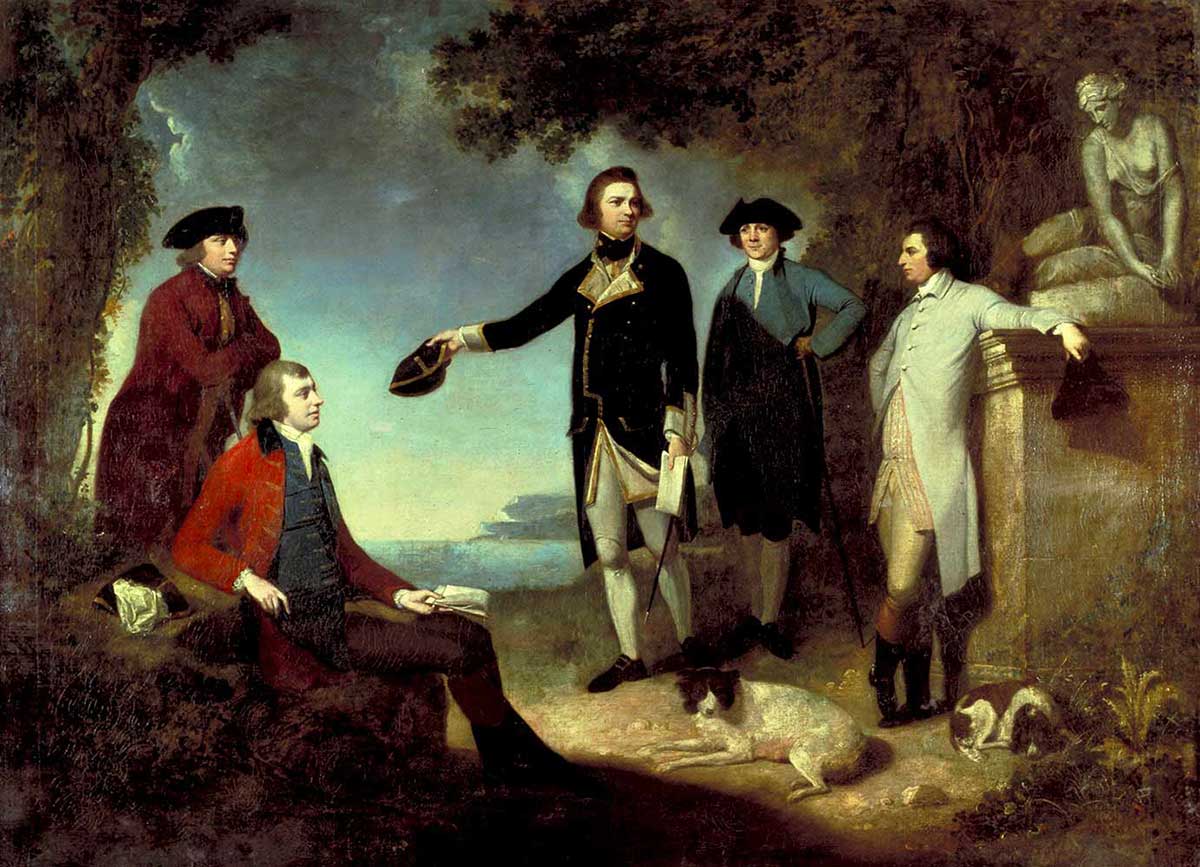 The five men are posing in countryside near an ocean. Sandwich is leaning against a classical statute. Solander and Banks are resting on a rock. Cook, centre, is in uniform gesturing at the sea.