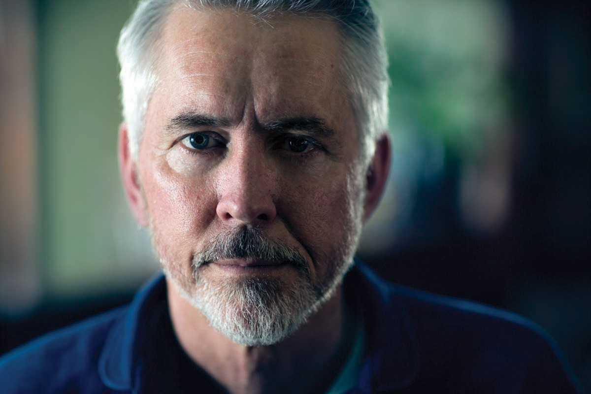 Studio portrait photograph of Scott Rankin.