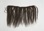 Apron liku Apron made of black plant fibres plaited into a long band.