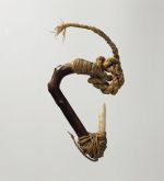 Fishhook matau Fishhook with wooden shank, bone point, and lashing of twisted cords of plant material.