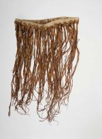 Skirt or apron tapu of apron made of red-brown dyed musa leaves, knotted to a plaited band.