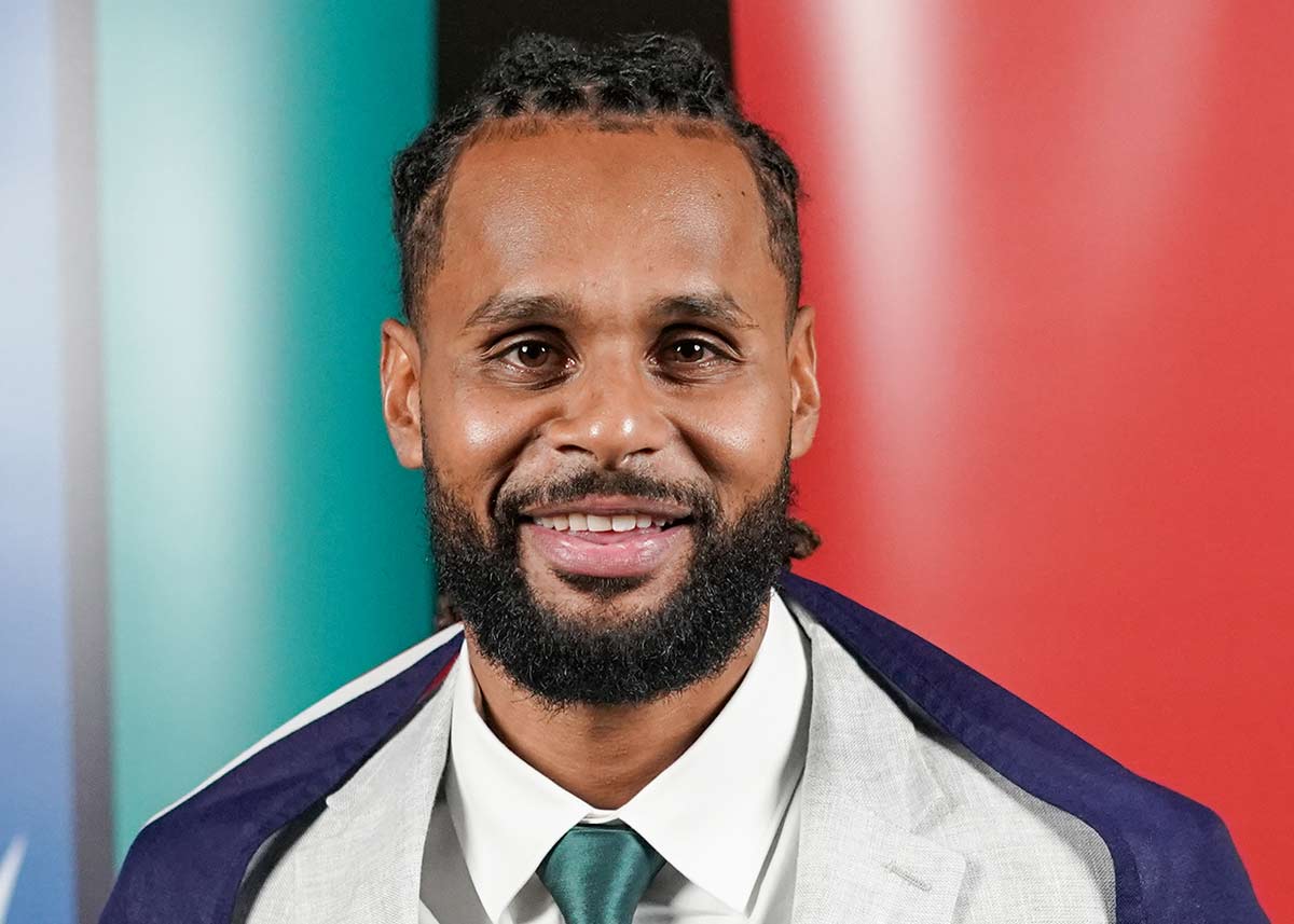 Studio portrait photograph of Patty Mills AM.