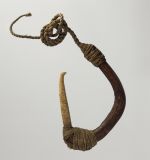 Fishhook matau Fishhook with curved wooden shank, bone point, and lashing of twisted cords of plant material.
