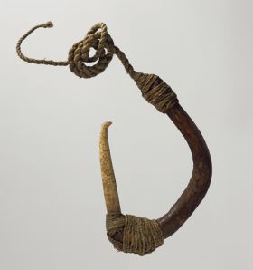 Fishhook matau Fishhook with curved wooden shank, bone point, and lashing of twisted cords of plant material.