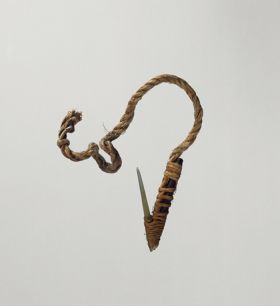 Fishhook matau Fishhook with shank made of black wood, fish bone point, with short, twisted cord, and lashing made of plant material.