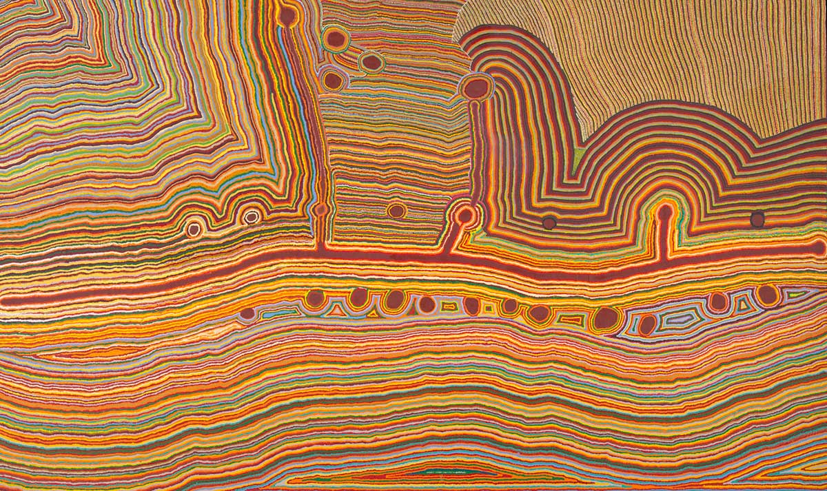 Painting featuring an intricate and colourful design. There are several concentric circles surrounded by wavy lines in random patterns.