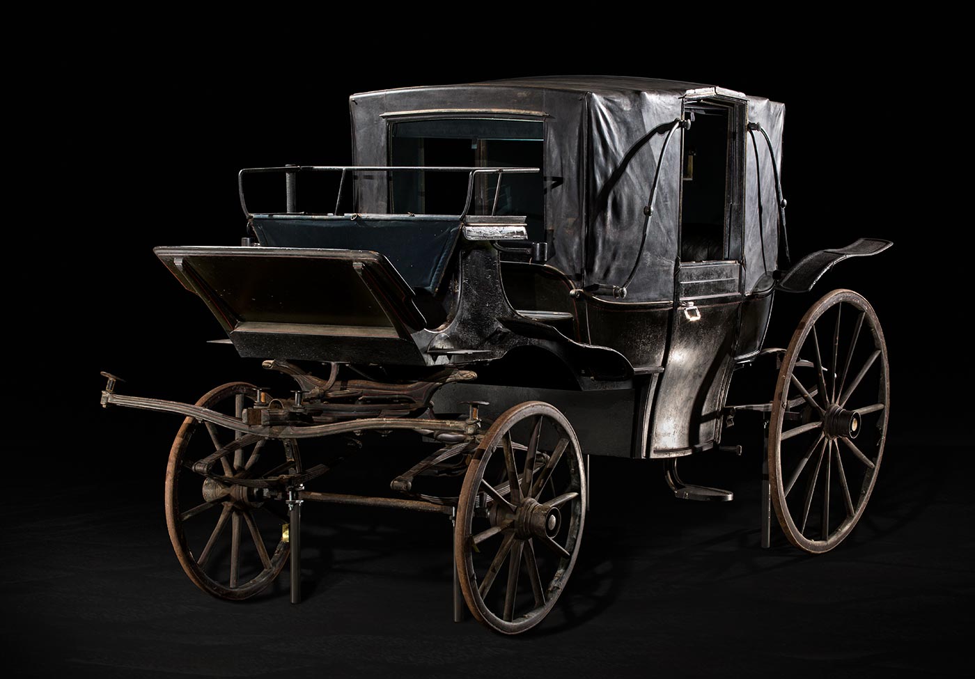 A carriage photographed in a studio.