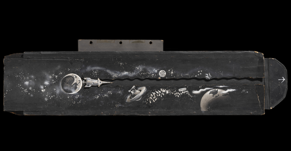 A black and white rectangular panel showing a hand-painted  galaxy. The outerspace scene has a moon towards the left and Earth on the right. Beside the moon is a rocket ship attached to a sliding panel.