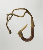 Fishhook matau Fishhook with curved wooden shank, bone point, and lashing of twisted cords of plant material.