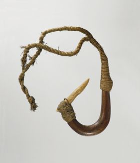 Fishhook matau Fishhook with curved wooden shank, bone point, and lashing of twisted cords of plant material.