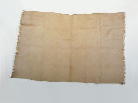 Mat kie efu Mat made of diagonally plaited light yellow leaf strips, by alternately placing one stripe with the glazed side of the leaf up and the other with the unglazed side up.